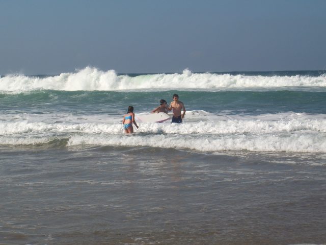 Children enjoying the surf on South Africa's east coast beaches.