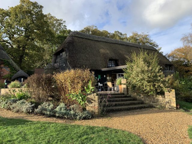 Entrance to Furzy Gardens with stone steps showing visitors the entrance.