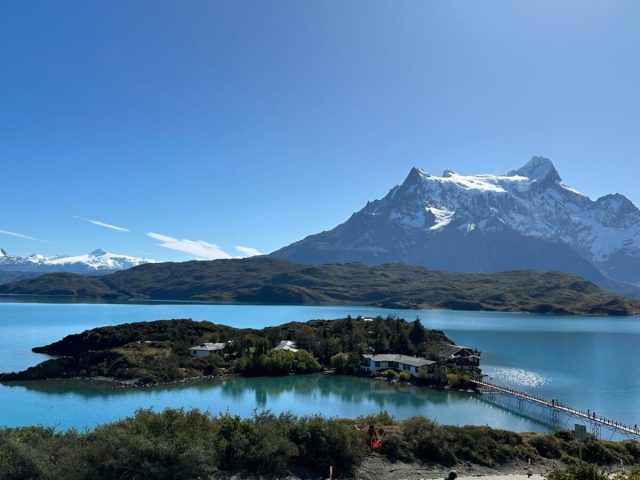 An island with bridge links to the mainland on Lake Pekoe Patagonia Chile.