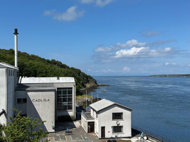 Islay Scotland Whisky Distillery white washed building on the water front