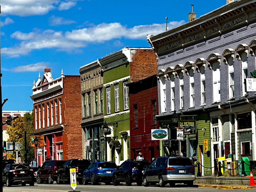 Main Street of buildings painted different colors in traditional western style in Leadville.
